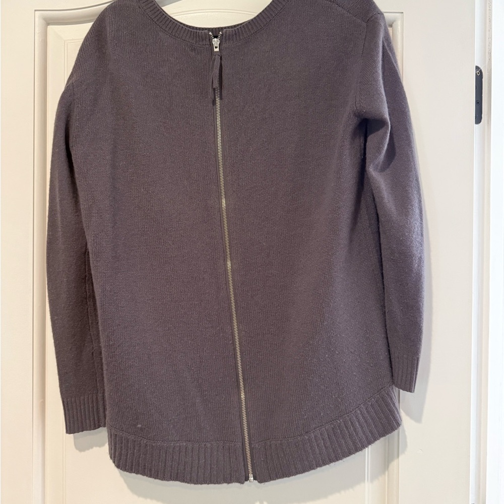 Cashmere sweater with zipper detail in the back